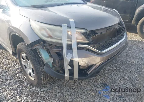 2015 Honda Cr-V Lx z USA, uszkodzony, nr VIN 5J6RM4H35FL043784